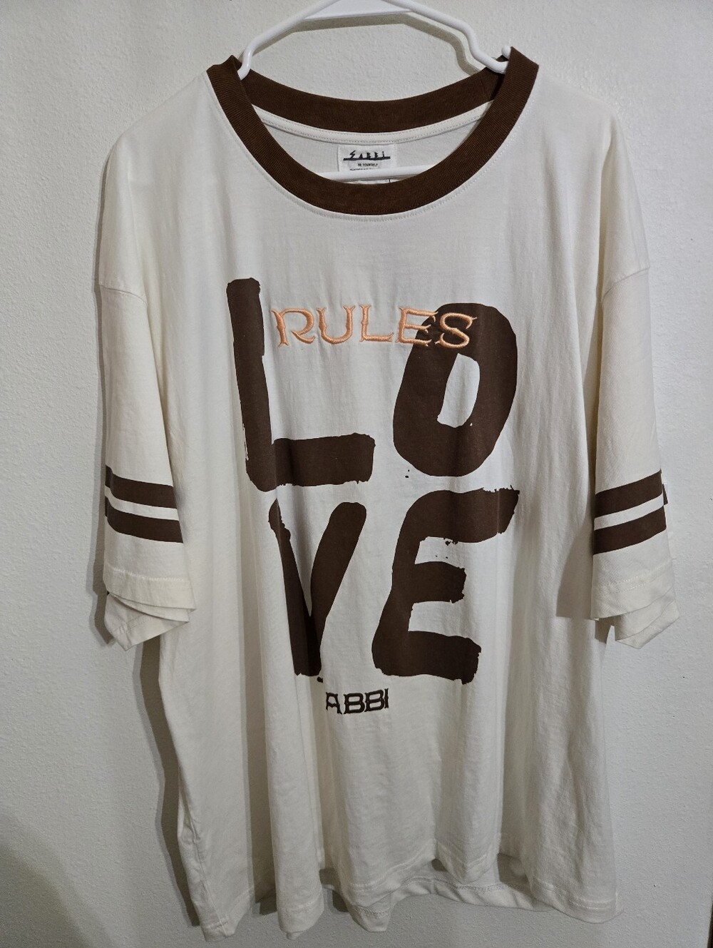 Sabbi Women's Cream and Brown Graphic Tee - LOVE Print